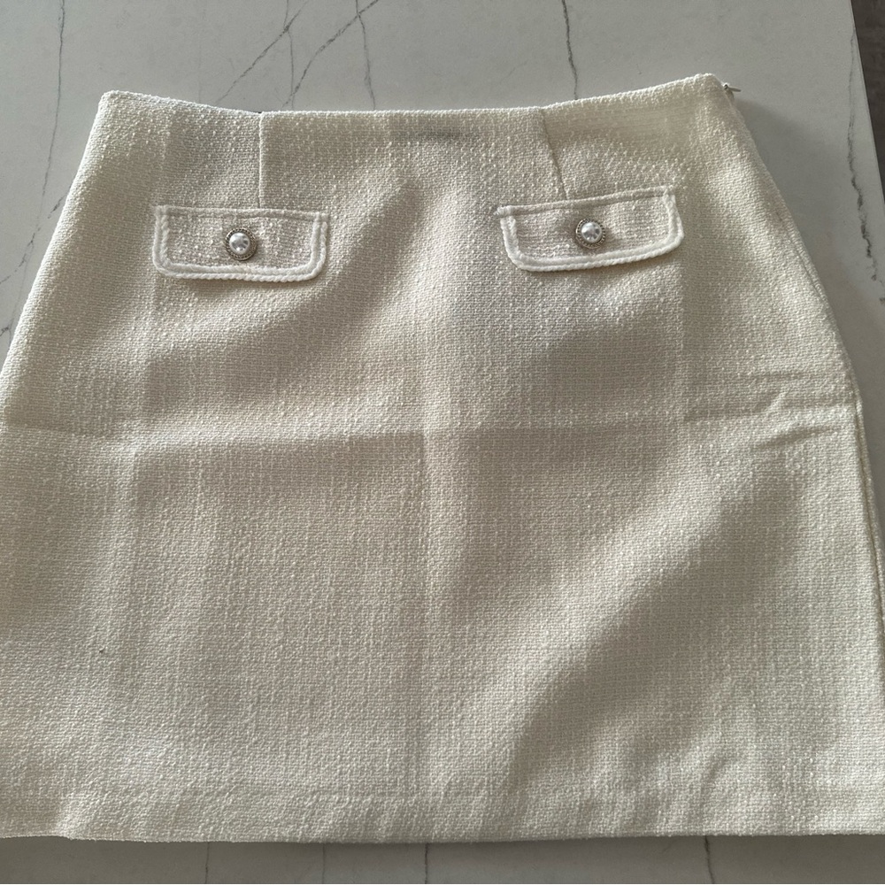 Elegant Cream Mini Skirt with Pocket Details